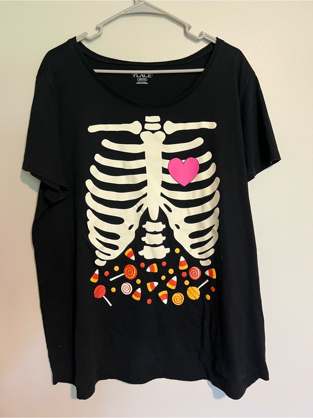 Place Black Tee with White Skeleton and Pink Heart